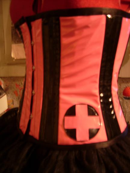 serre taille cyber nurse rose bonbon