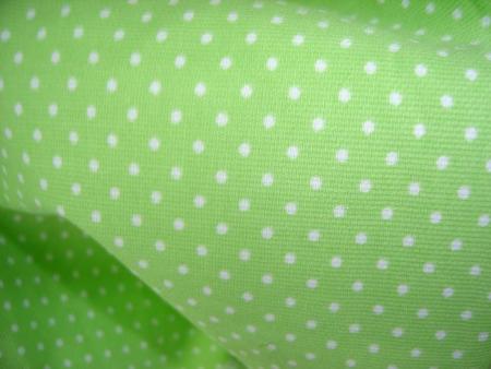 tissus vert pomme a poids blancs